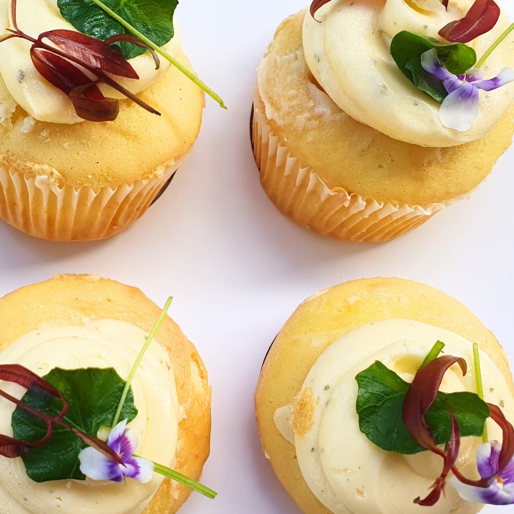 Vanilla Cupcakes with lemon myrtle frosting and native violets